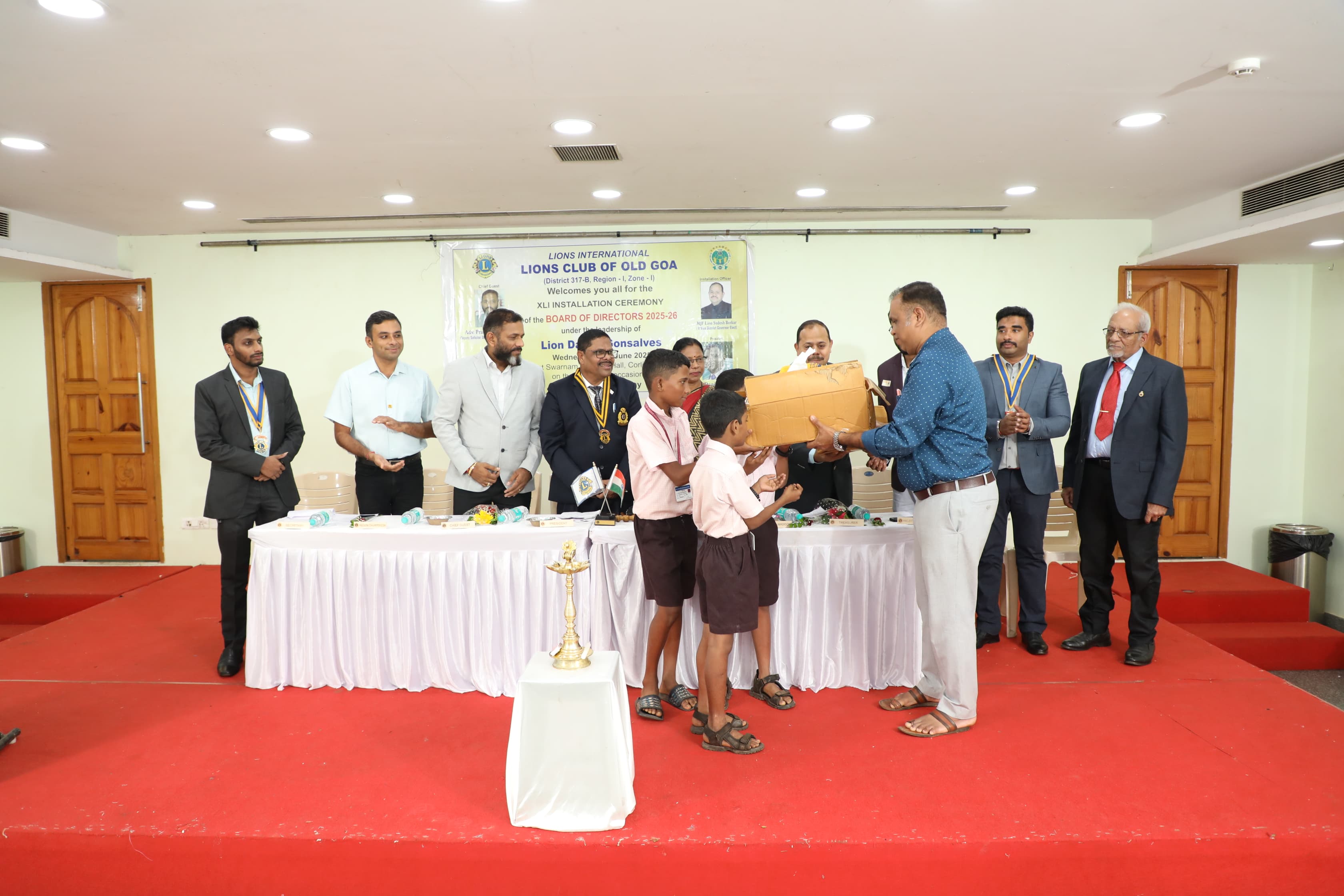 handed over Umbrellas to 50 students of Sundabhai School