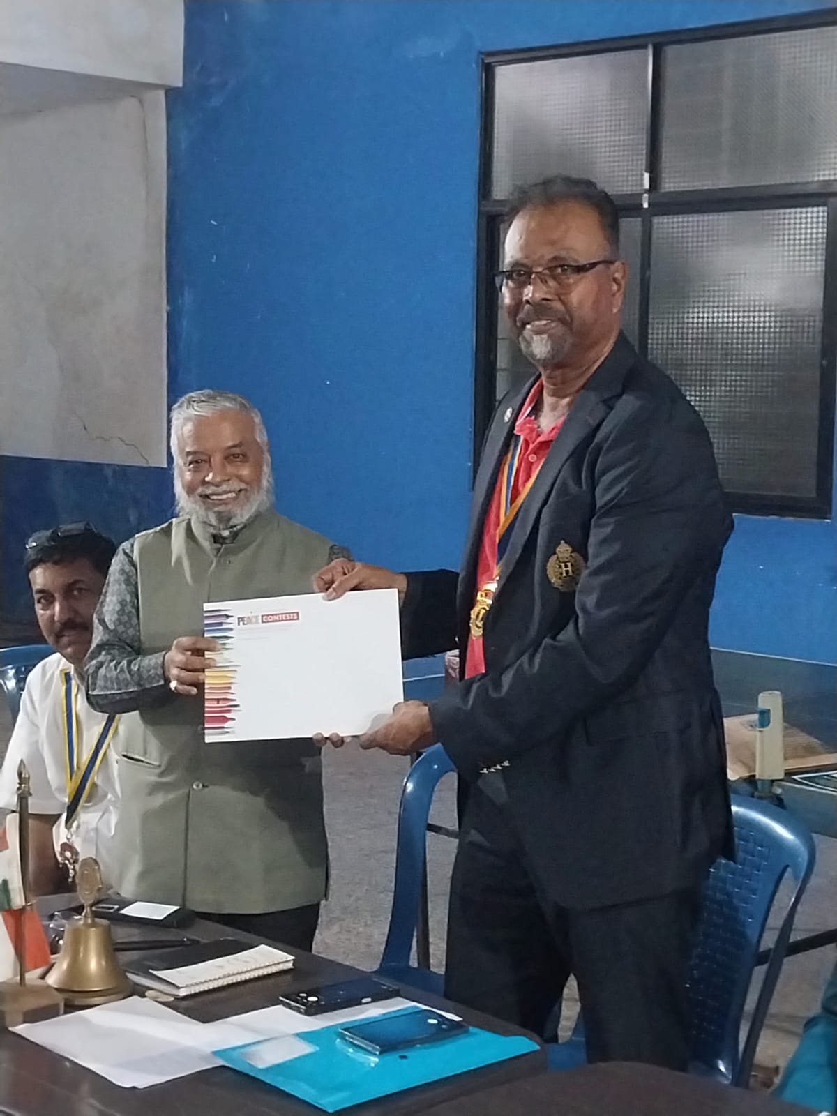 Handed over 2 peace poster kit to L C Aldona from my Region 5