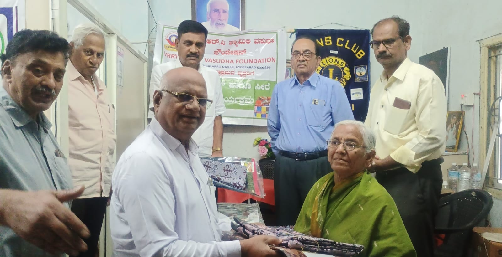 Distribution of bed sheets and sarees to old age home