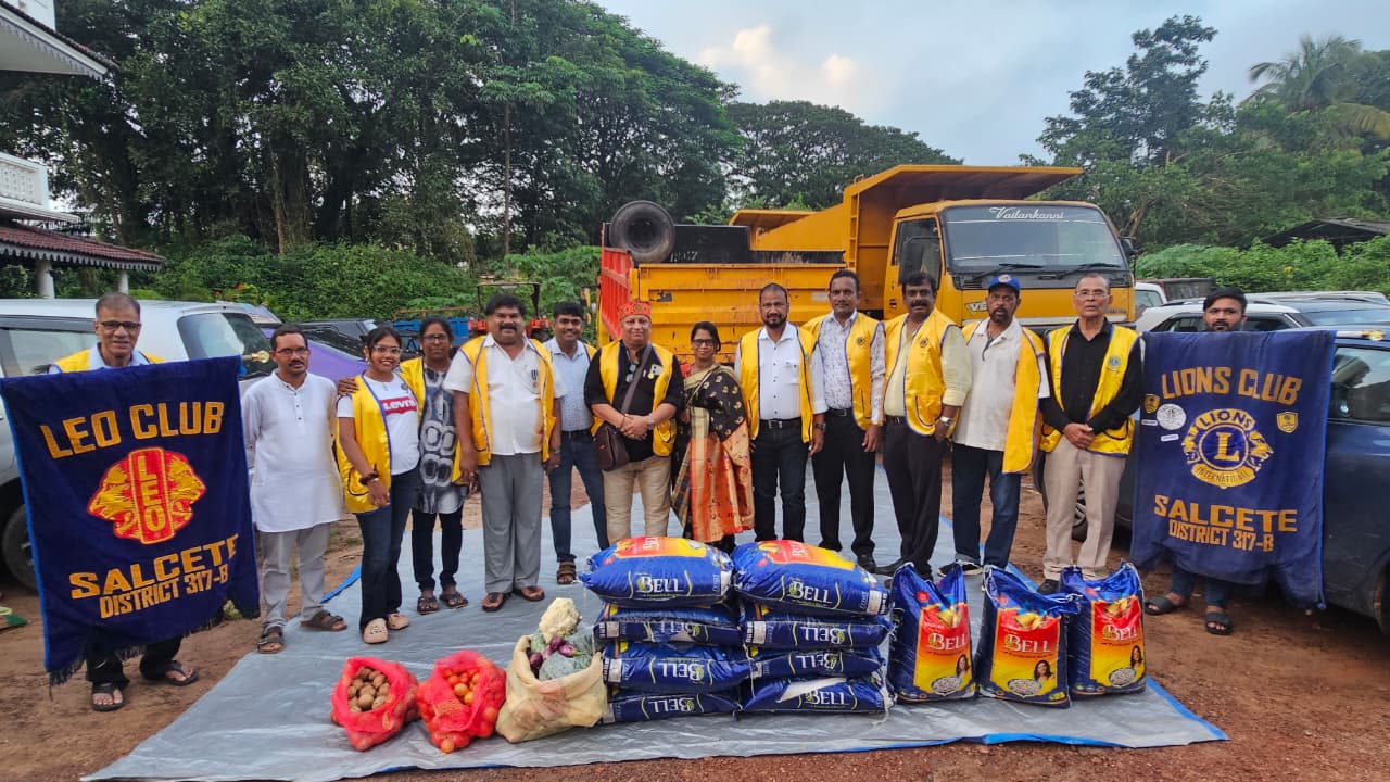 Distribution of food grains vegetables oil to the needy people.