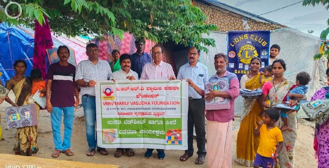 Distribution of bedsheets, pens and notebooks to poor families