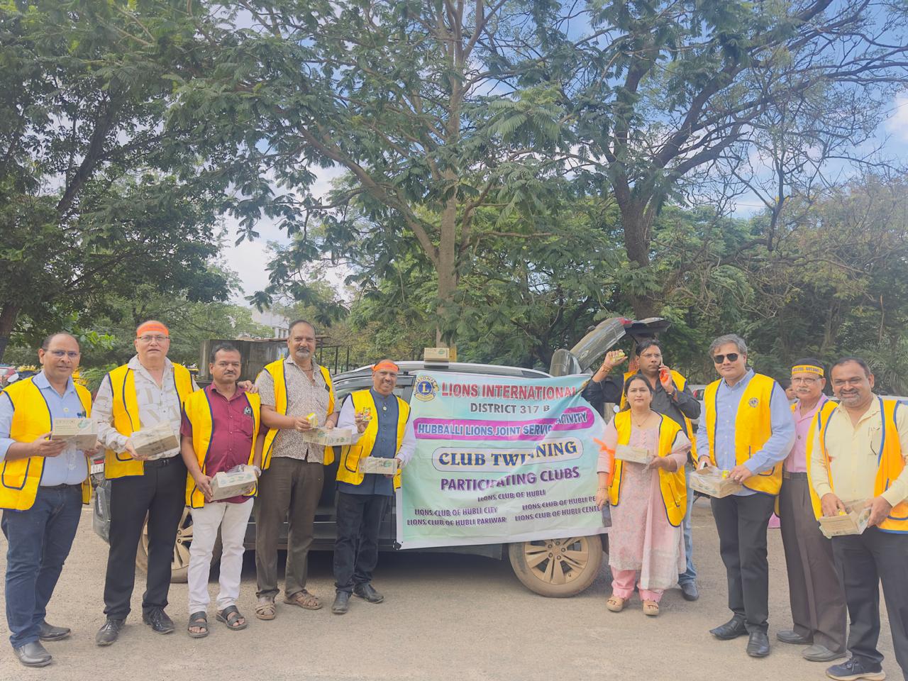 Serving juice to participants of rally