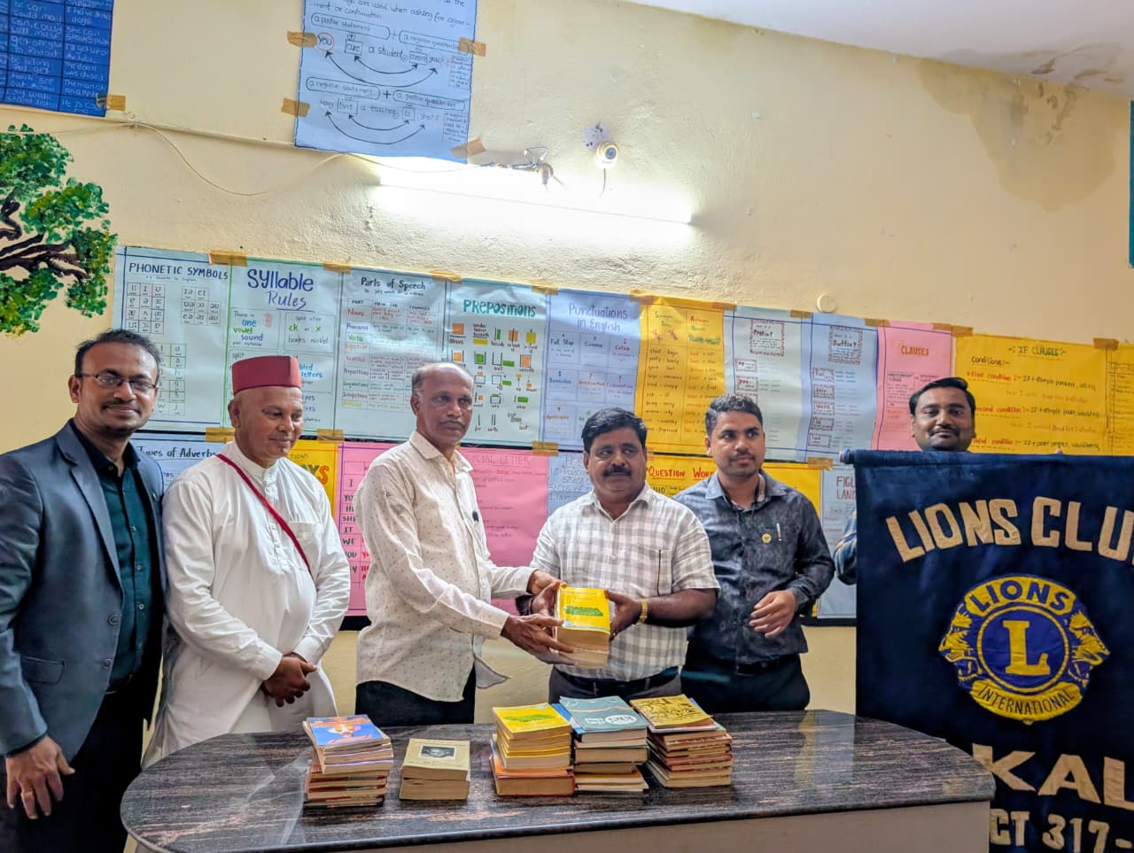Book distribution to lions library in ilkal.