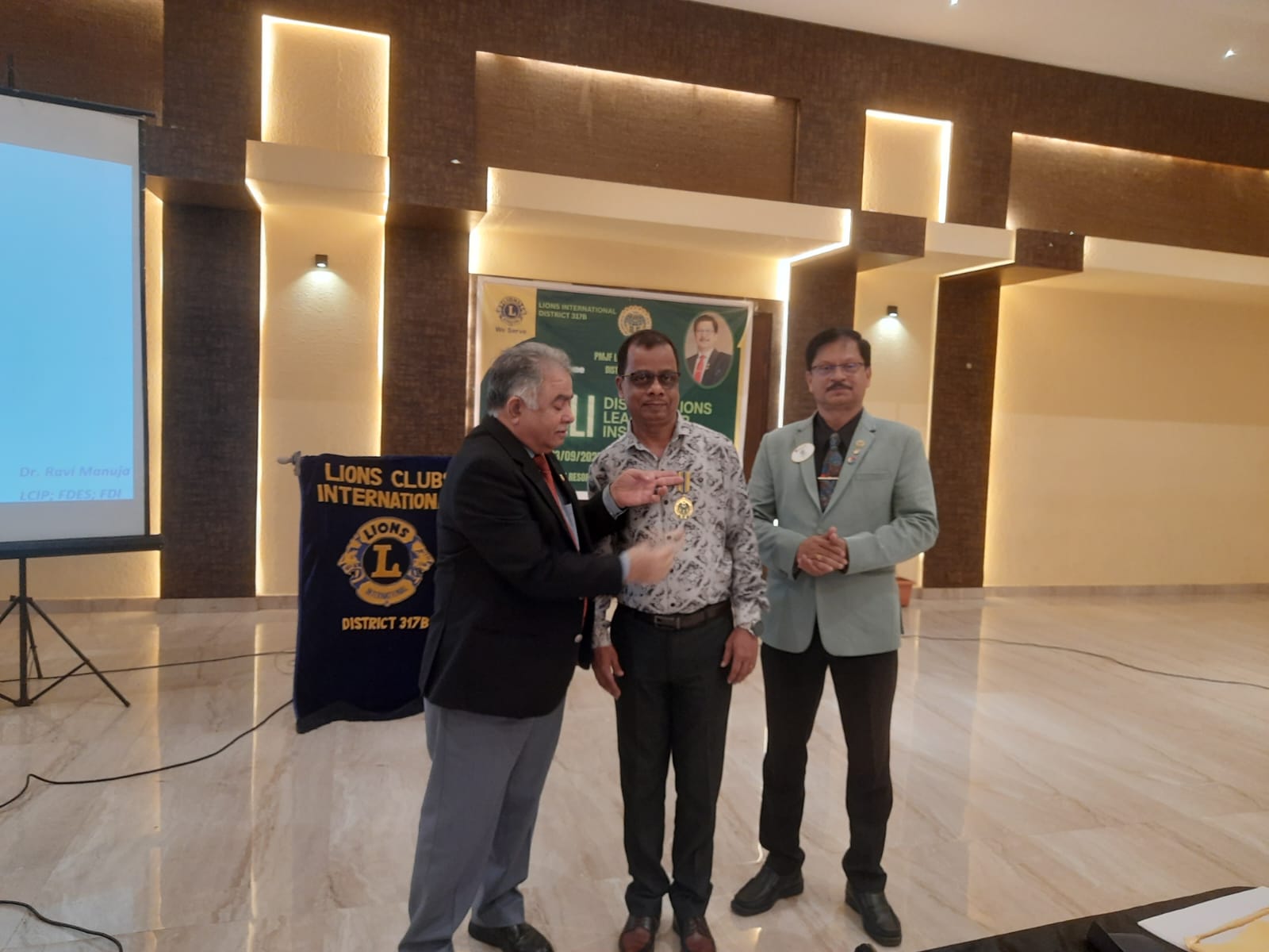 RECEIVED DISTRICT GOVERNOR MEDALLION DURING DLLI TRAINING FOR PROVIDING BEST INFORMATION TECHNOLOGY SERVICES AND SUPPORT TO THE CLUBS IN THE DISTRICT 317B
