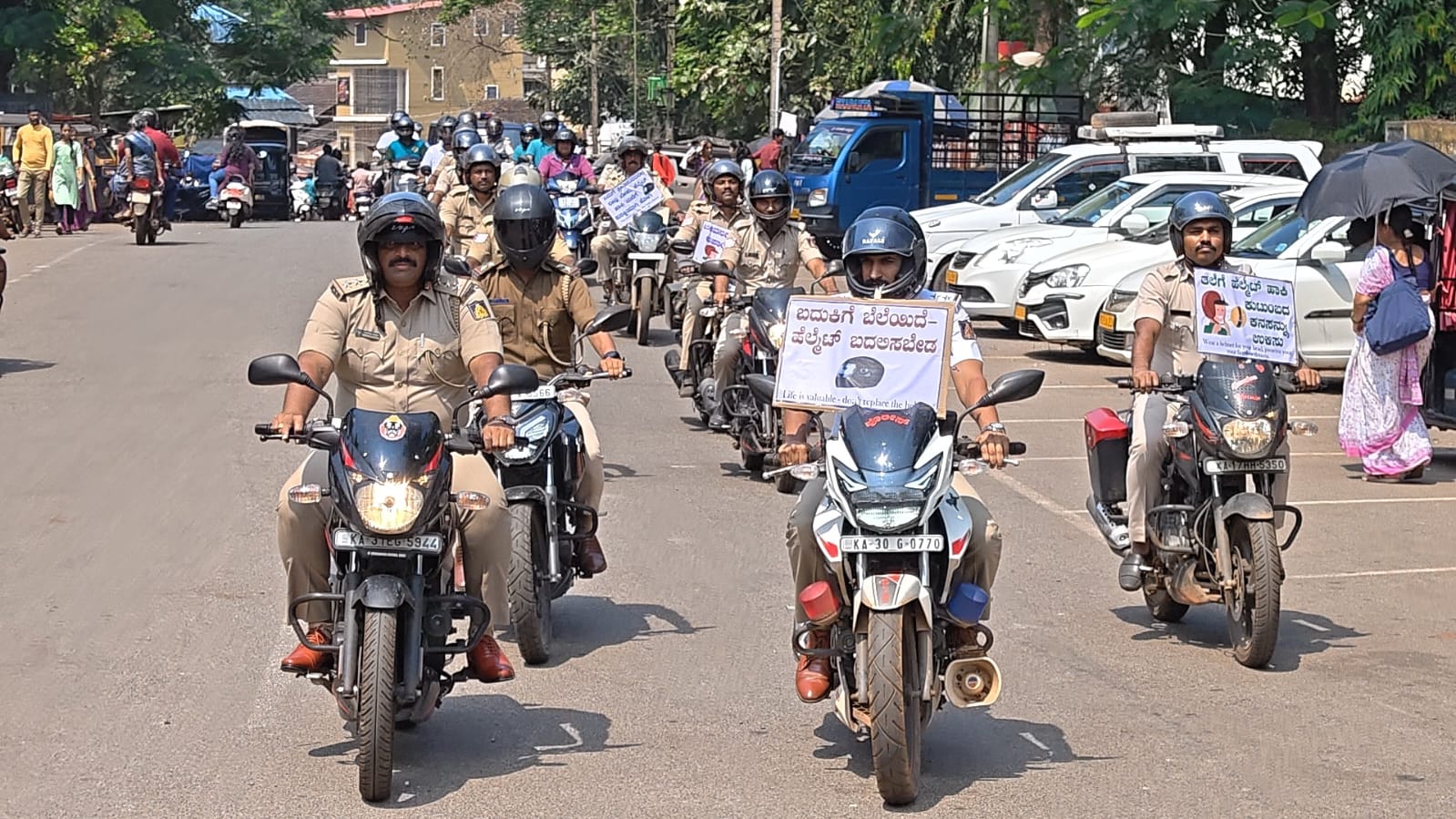 ORGANIZING PUBLIC AWARENESS PROGRAM.   HELMET AWARENESS RALLY
