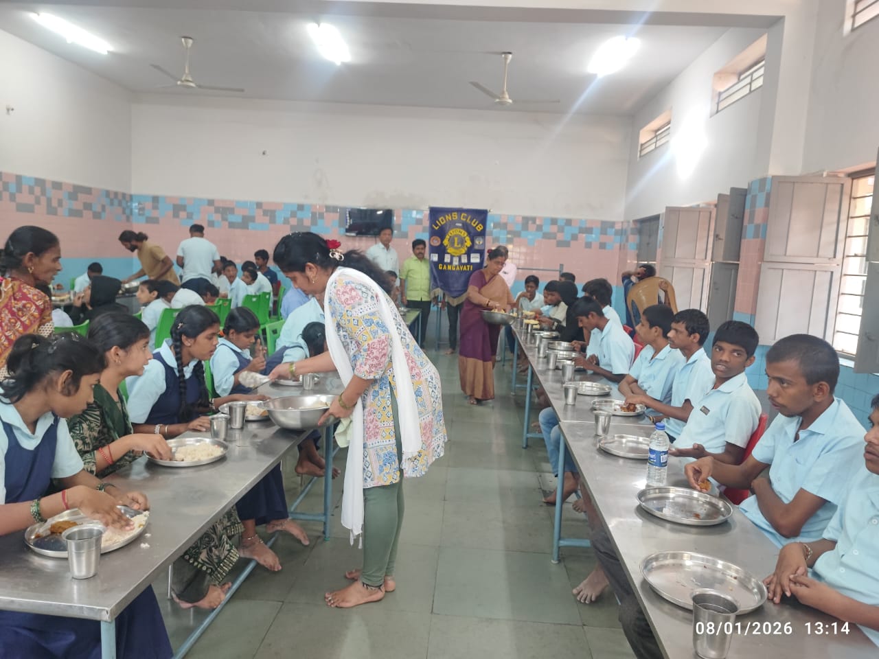 Distribution of food to mentally challenged children