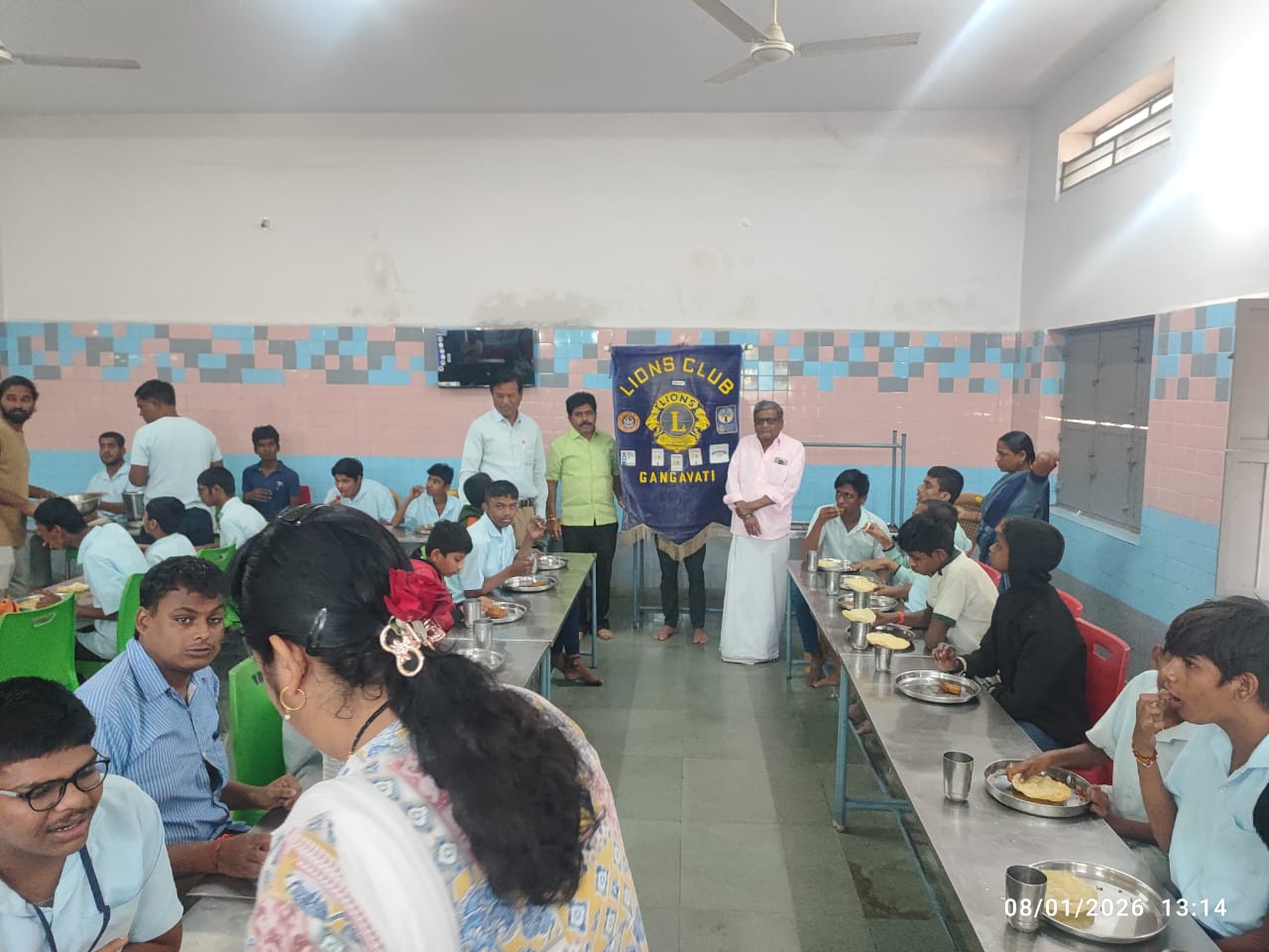 Distribution of food to mentally challenged children