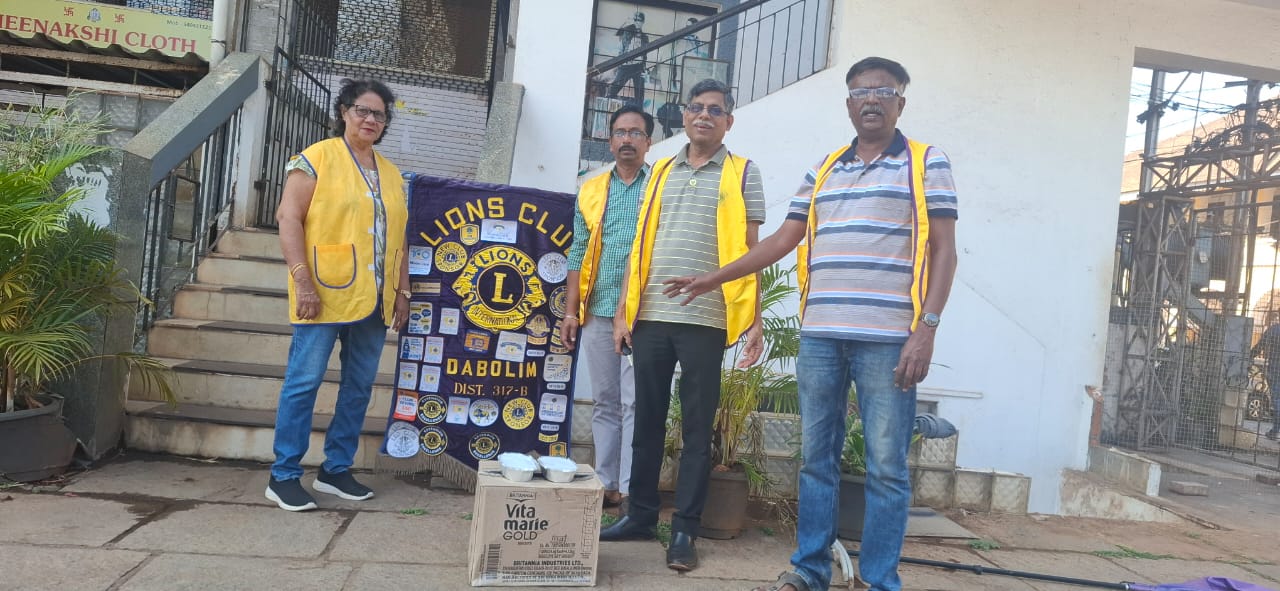 Serving Lunch Packets to the Needy Workers/travellers