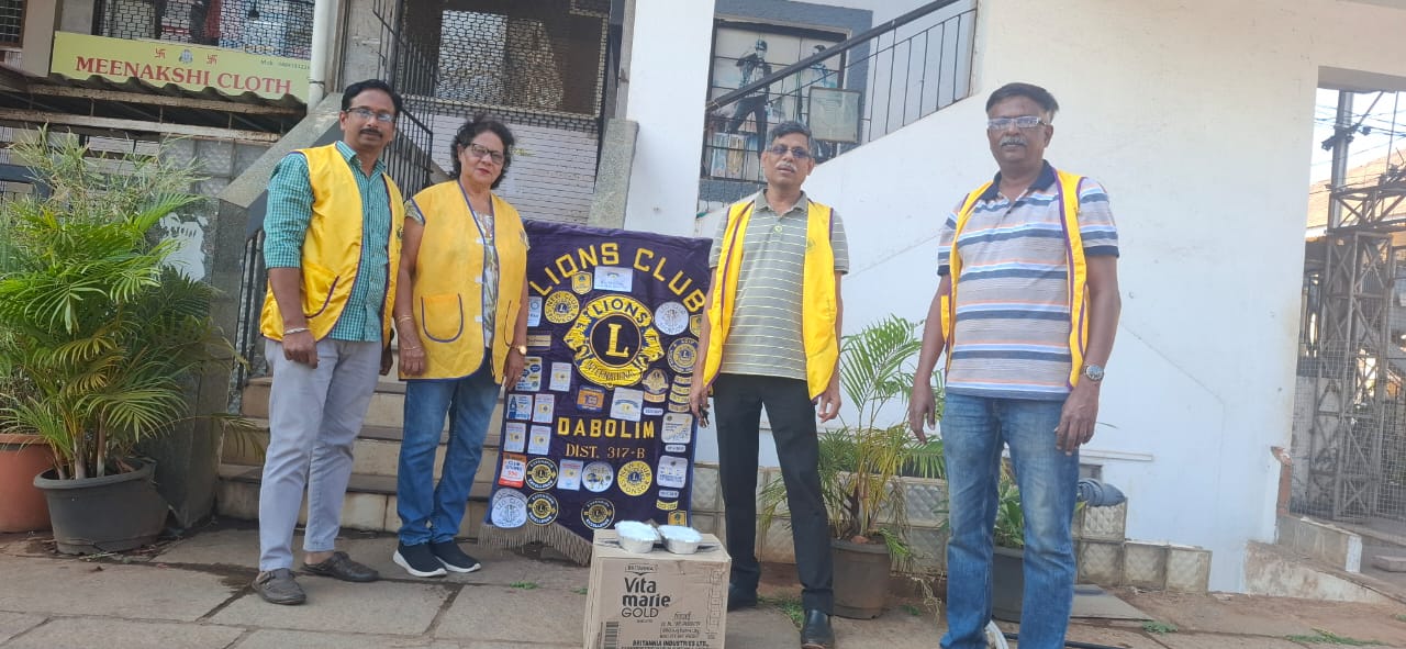 Serving Lunch Packets to the Needy Workers/travellers