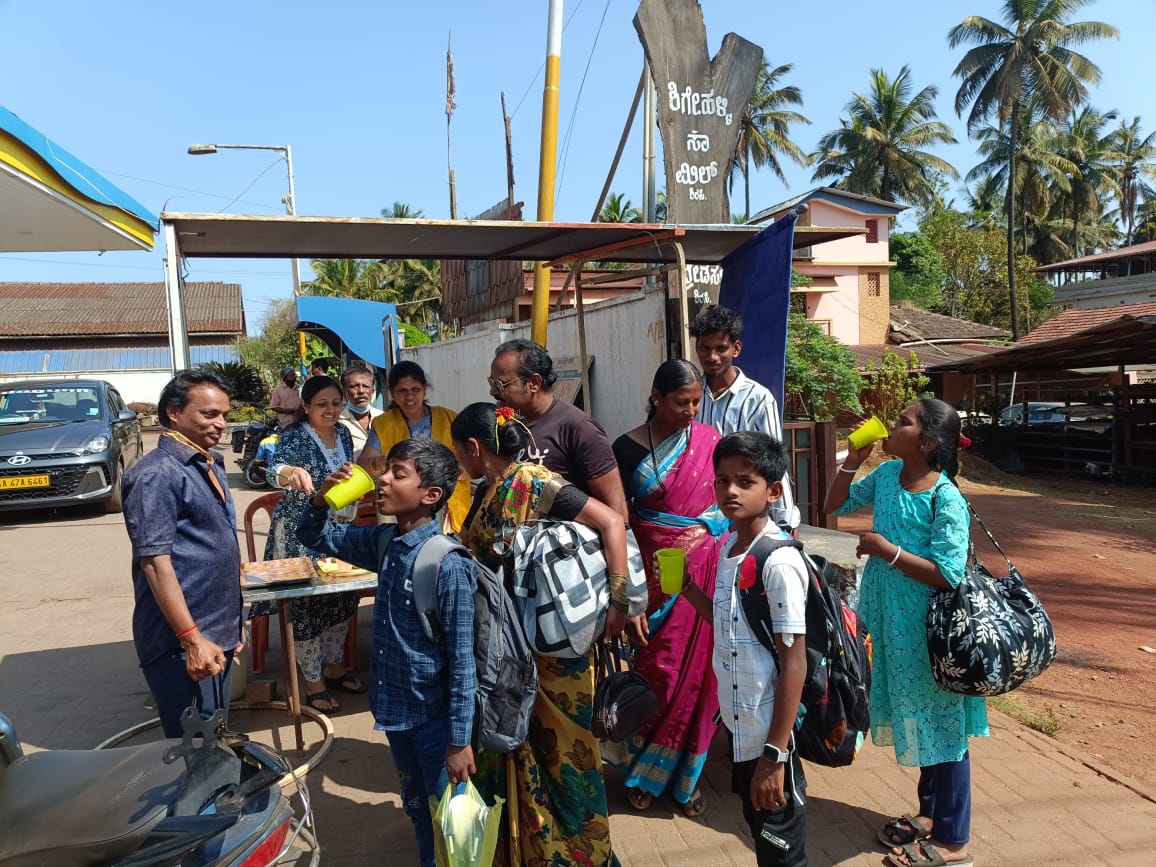 DISTRIBUTION OF COLD DRINKS BUTTERMILK AND DRINKING WATER TO PILGRIMS OF MARIKAMBA JATRA