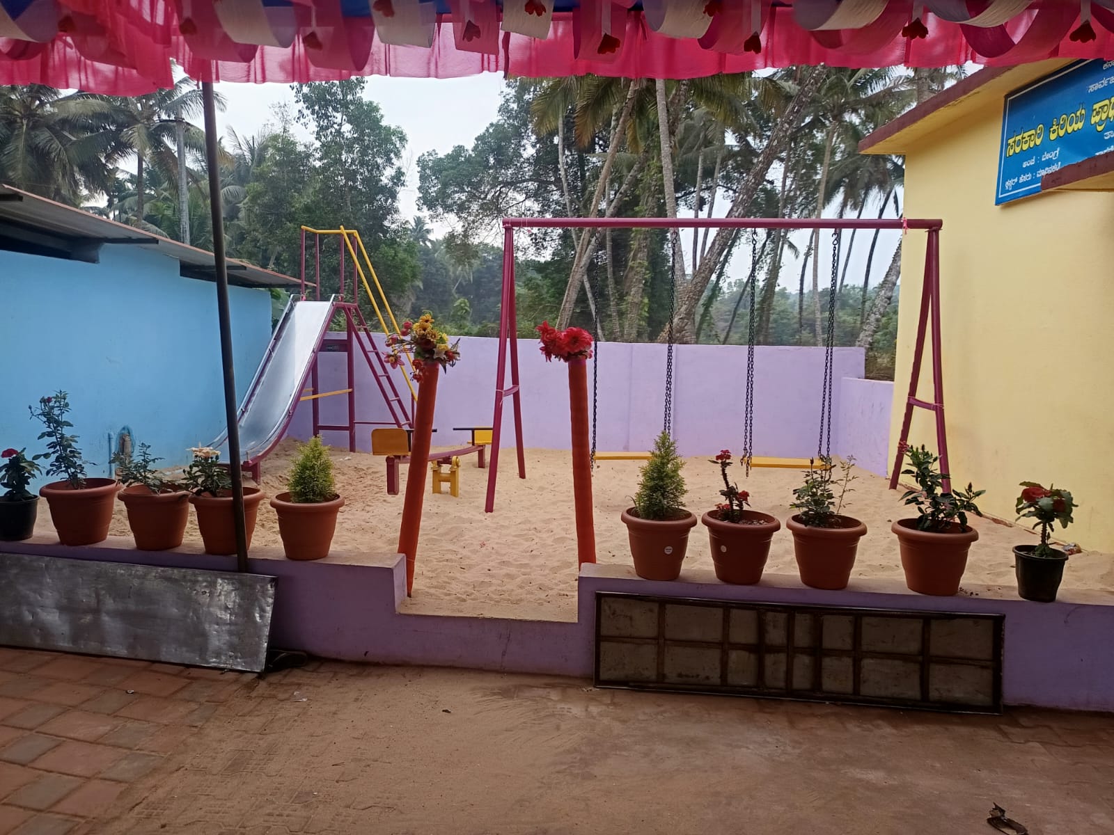 DONATED PLAY MATERIALS AND SHOE STANDS TO GOVT SCHOOL.