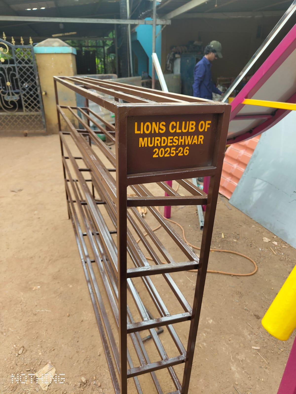 DONATED PLAY MATERIALS AND SHOE STANDS TO GOVT SCHOOL.