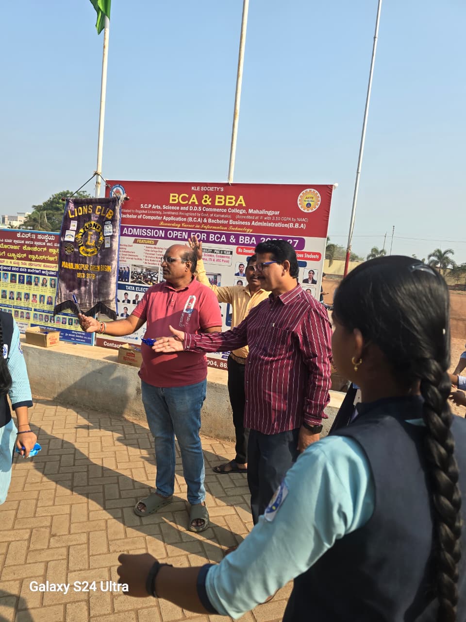 Distribution of pens to PU exam going students 