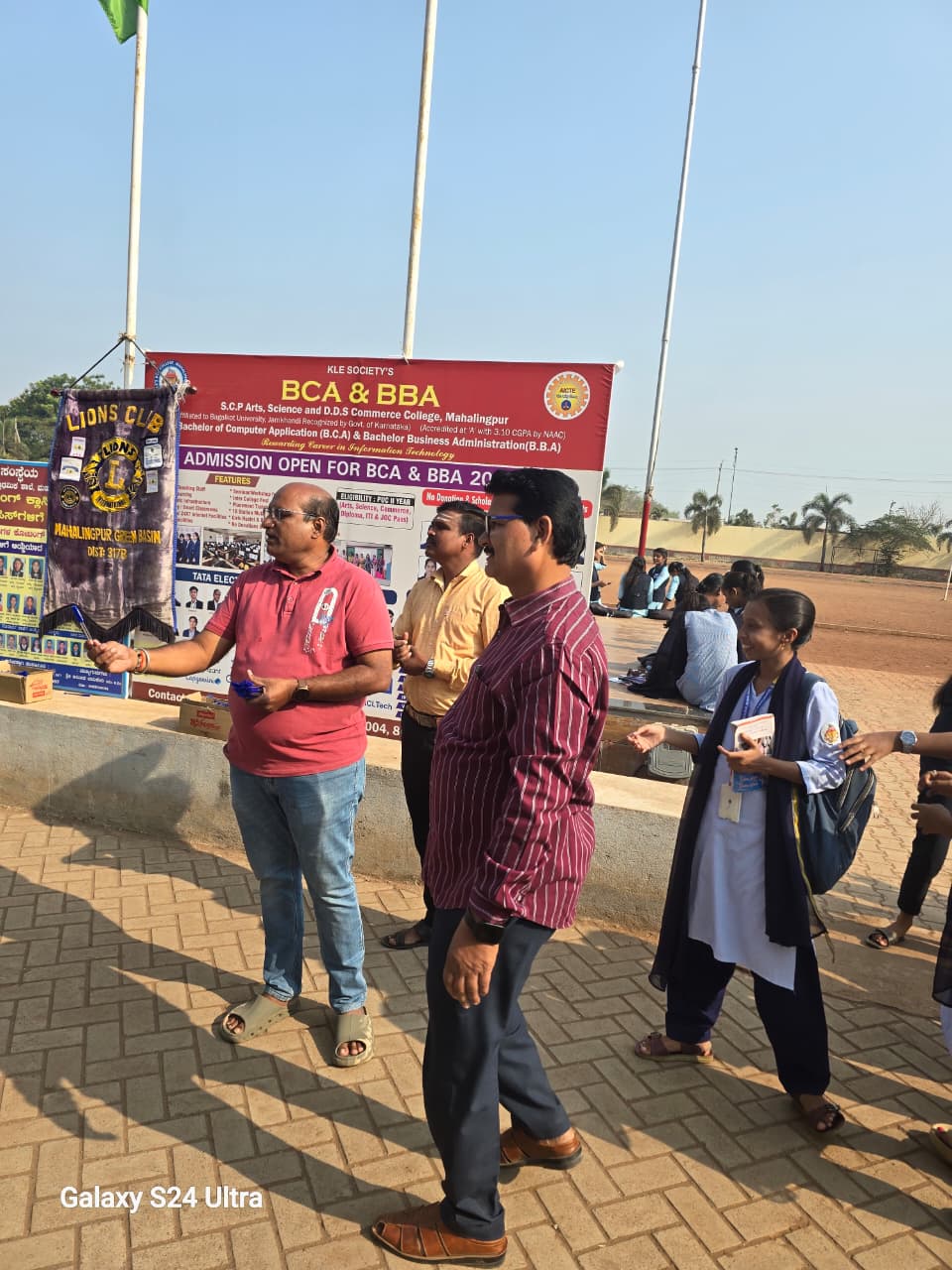 Distribution of pens to PU exam going students 