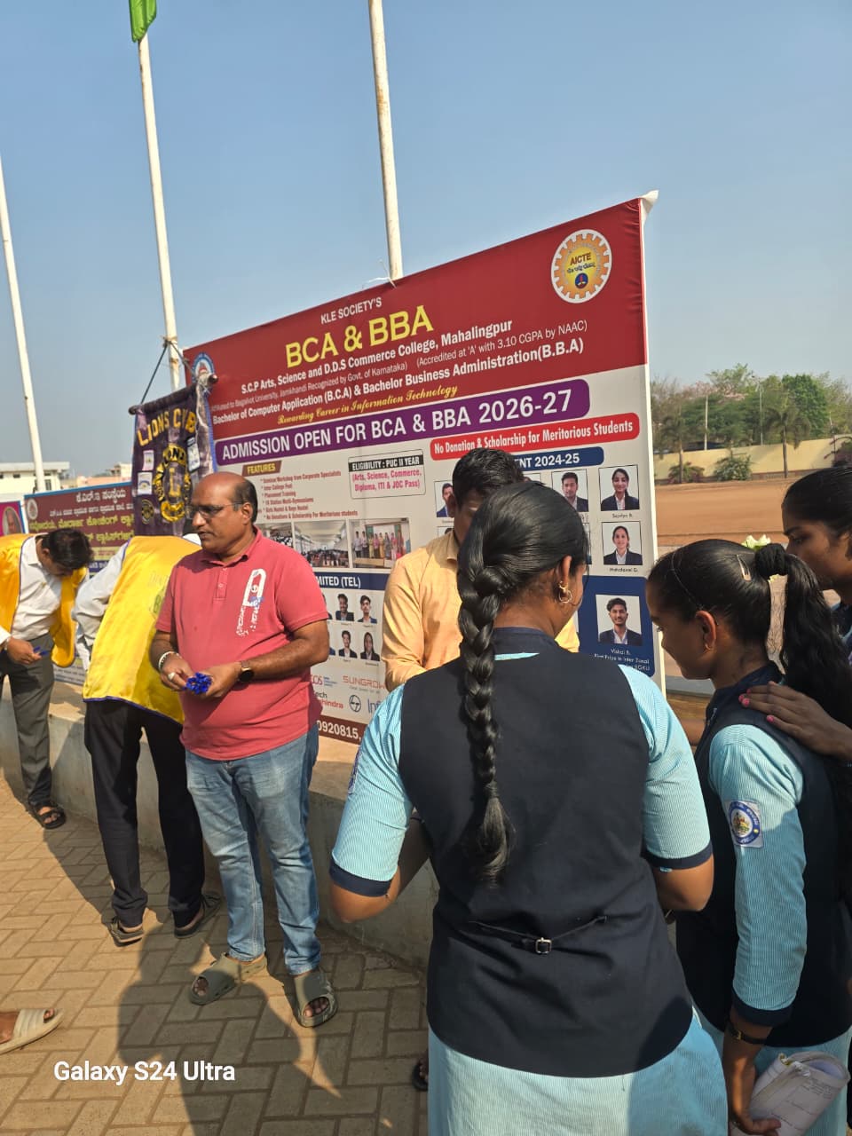 Distribution of pens to PU exam going students 