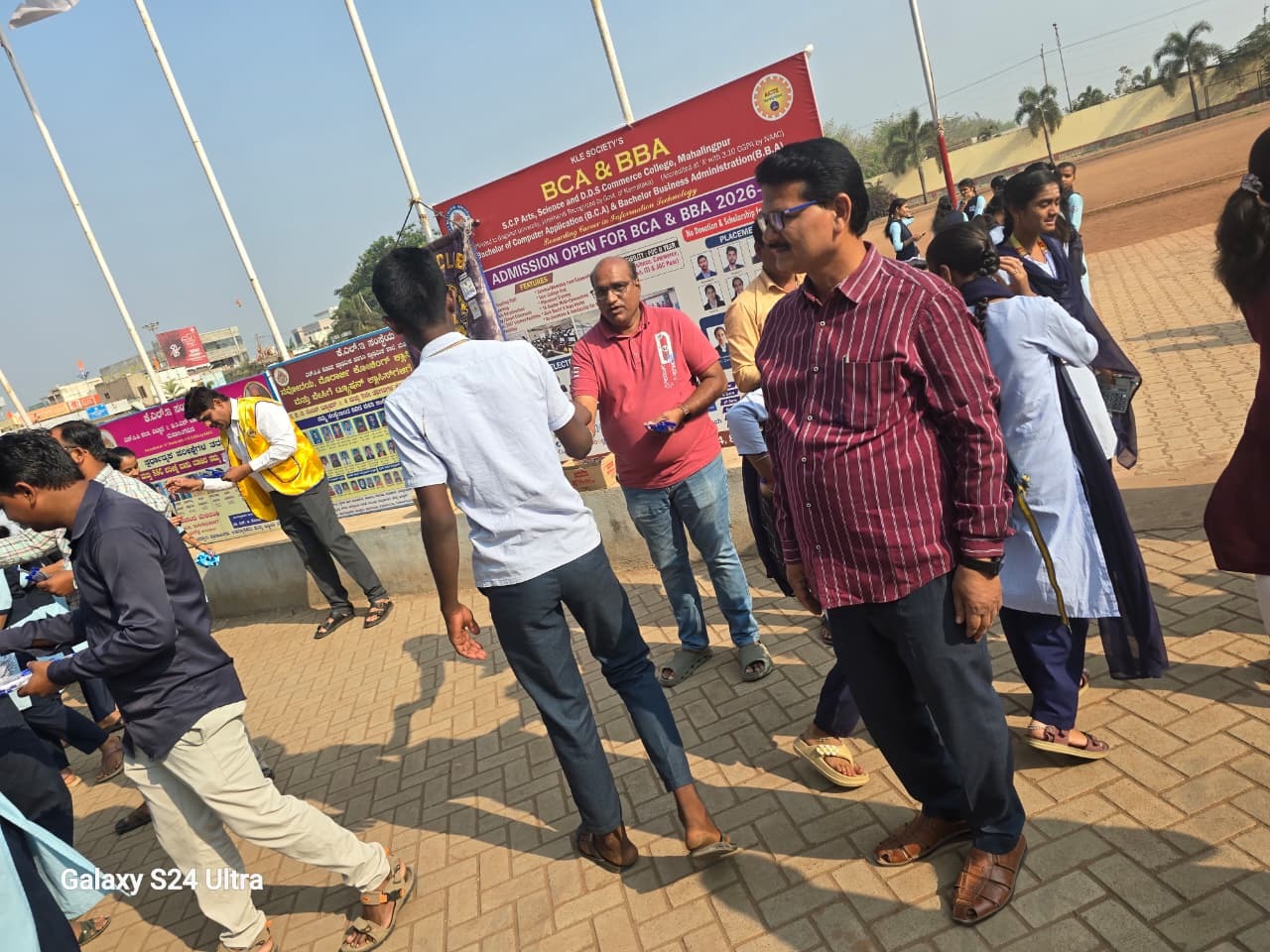 Distribution of pens to PU exam going students 