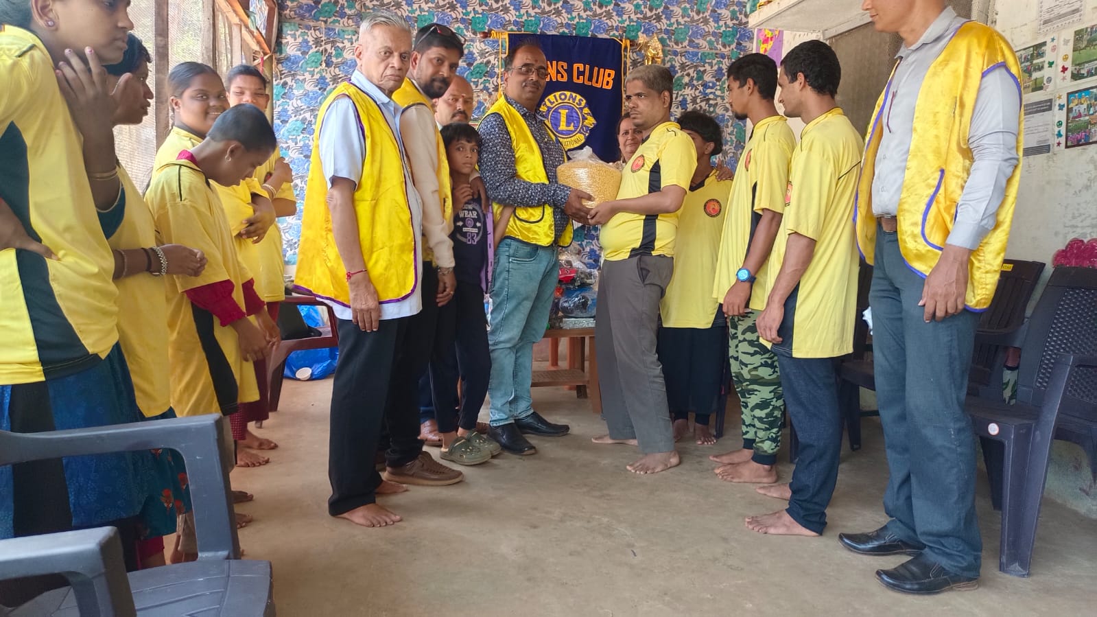 DISTRIBUTED FOOD ITEMS AND PLAY MATERIALS TO SPECIAL SCHOOL CHILDREN.