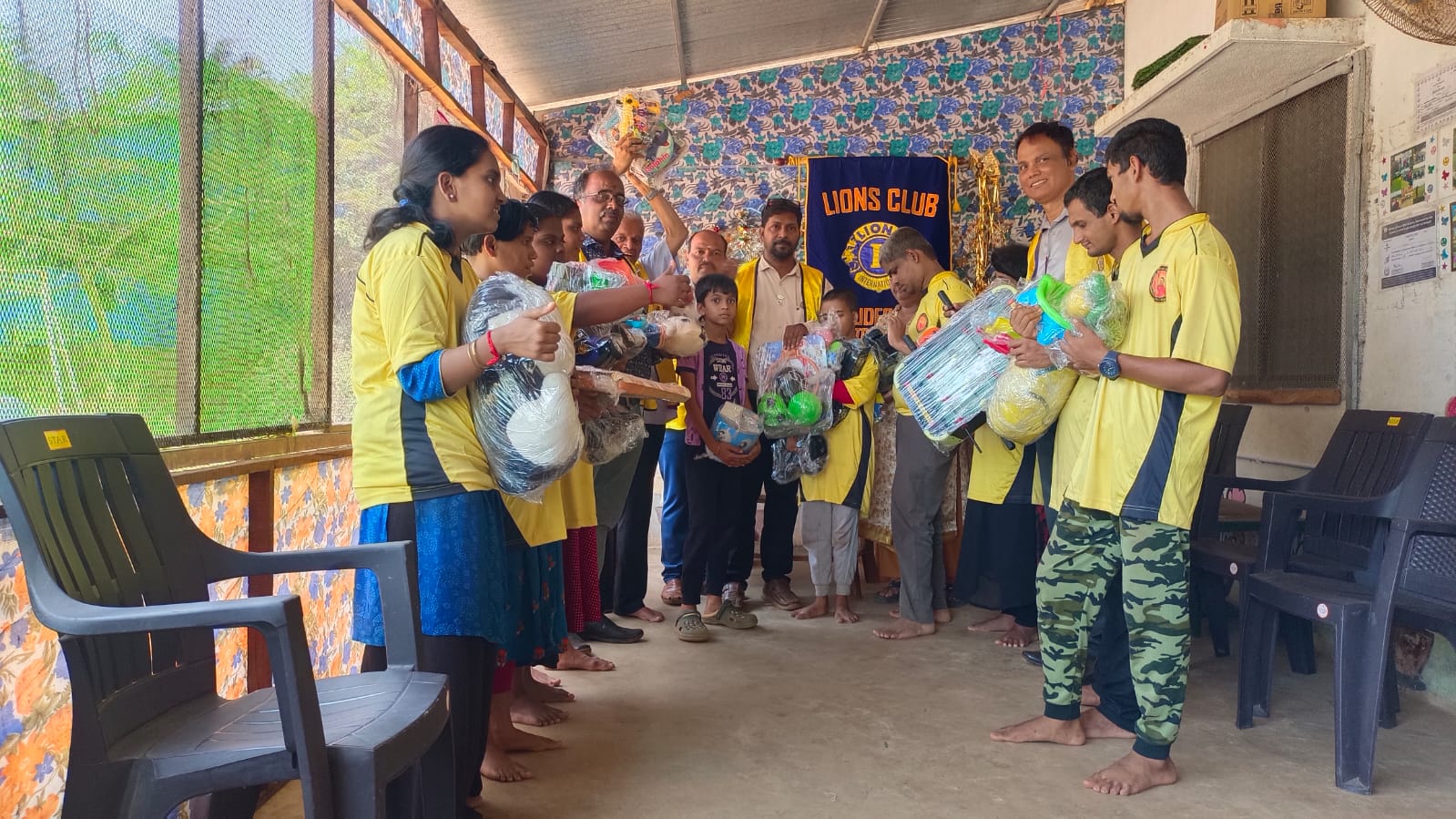 DISTRIBUTED FOOD ITEMS AND PLAY MATERIALS TO SPECIAL SCHOOL CHILDREN.