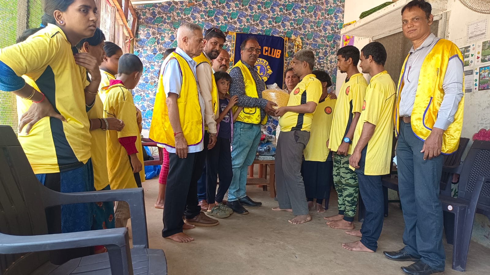 DISTRIBUTED FOOD ITEMS AND PLAY MATERIALS TO SPECIAL SCHOOL CHILDREN.
