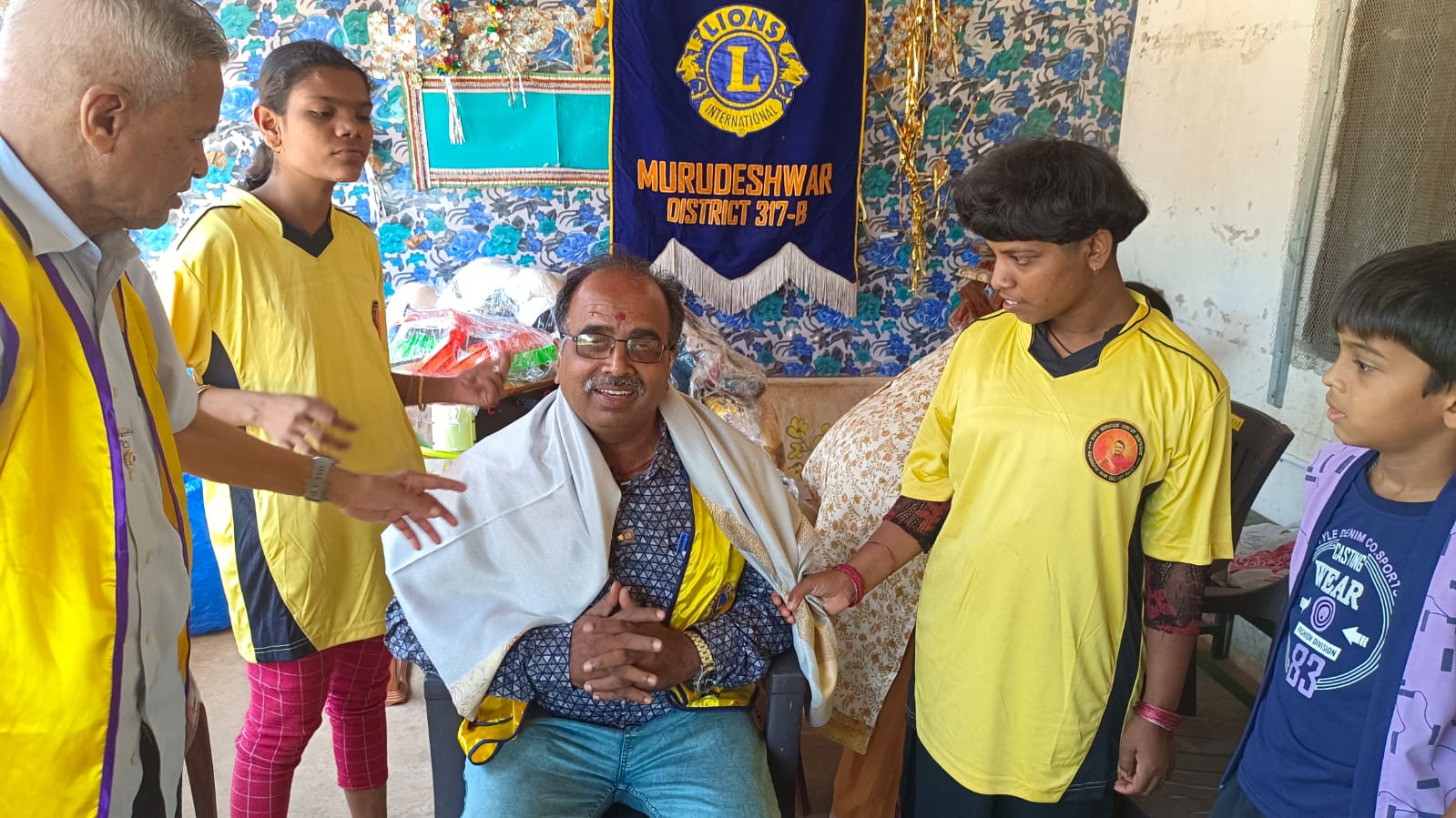 DISTRIBUTED FOOD ITEMS AND PLAY MATERIALS TO SPECIAL SCHOOL CHILDREN.