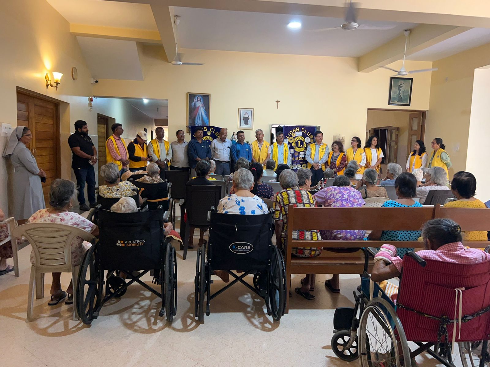 Serving Food to inmates and staff of Home for Senior Citizens, Franciscan Hospitaller Sisters, Old Goa twining activity along with LC Dabolim