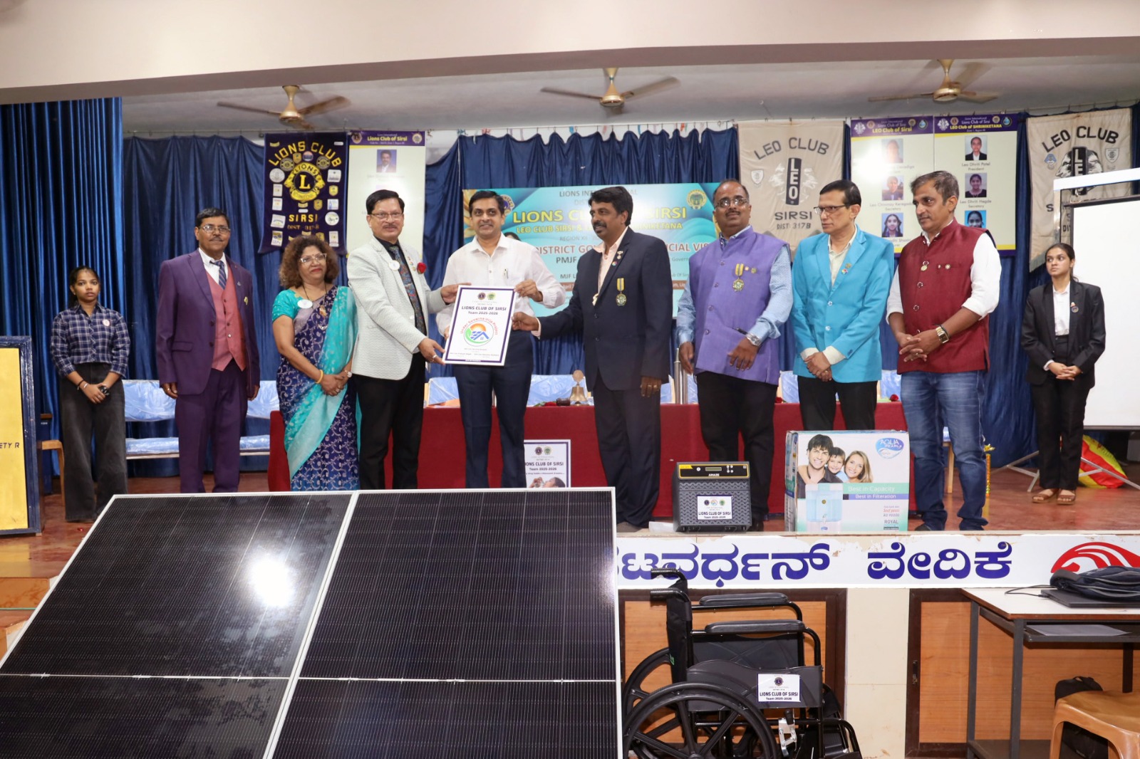 WORLDWIDE ENVIORNMENT SERVICE WEEK BY LIONS CLUB OF SIRSI. SOLAR POWER UNIT DISTRIBUTION